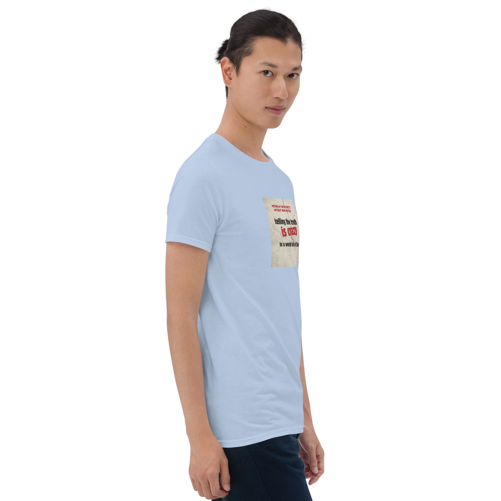 Light blue T-shirt side front with small rectangular graphic print