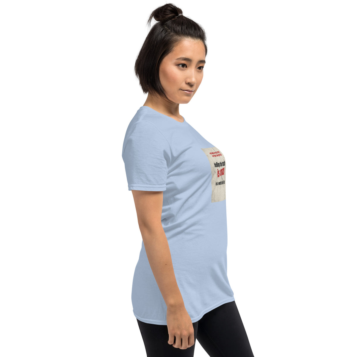 Light blue unisex T-shirt, side view, crew neck and short sleeves with front graphic