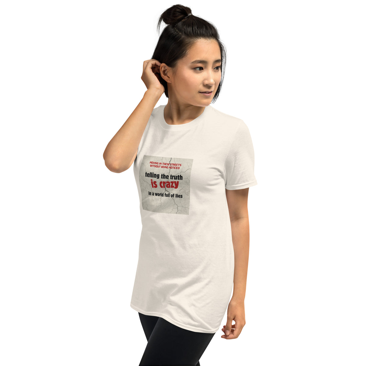 White unisex T-shirt with front square text graphic and short sleeves.