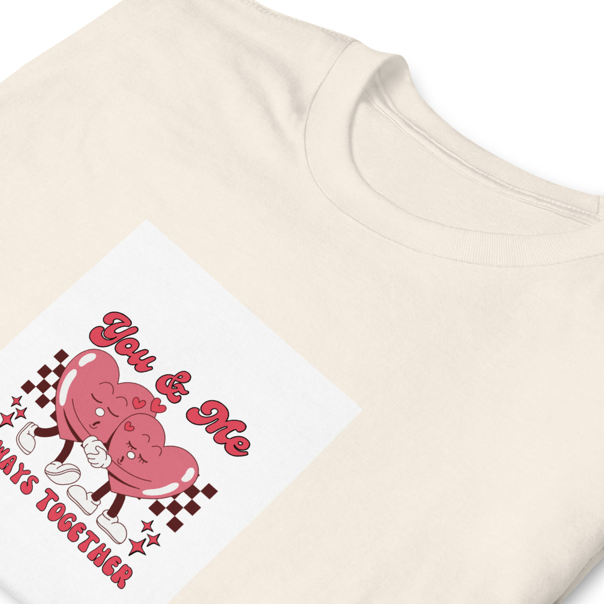 Cream graphic tee close-up of &