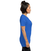 Blue unisex graphic T-shirt, profile view with back graphic patch