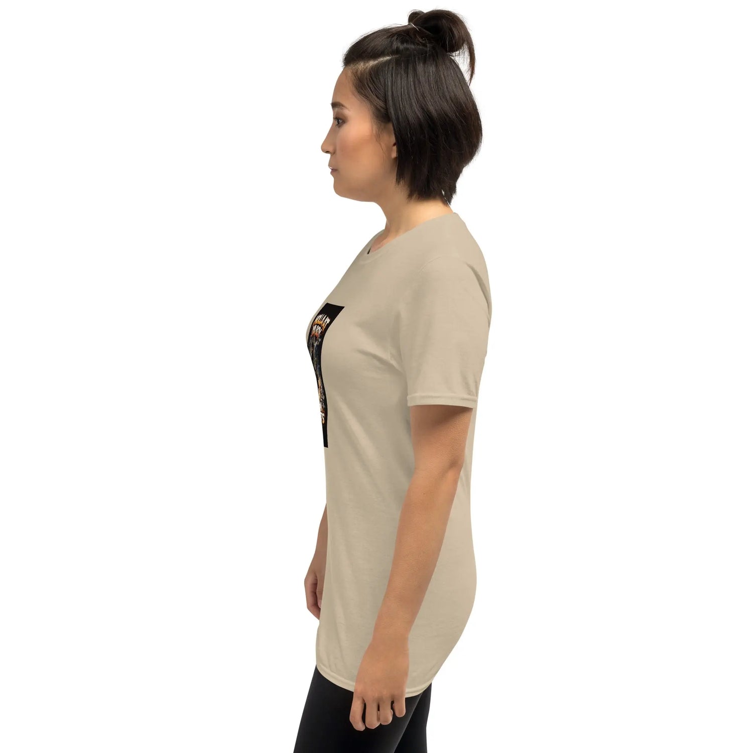 Sand unisex T-shirt side view with front graphic print edge visible