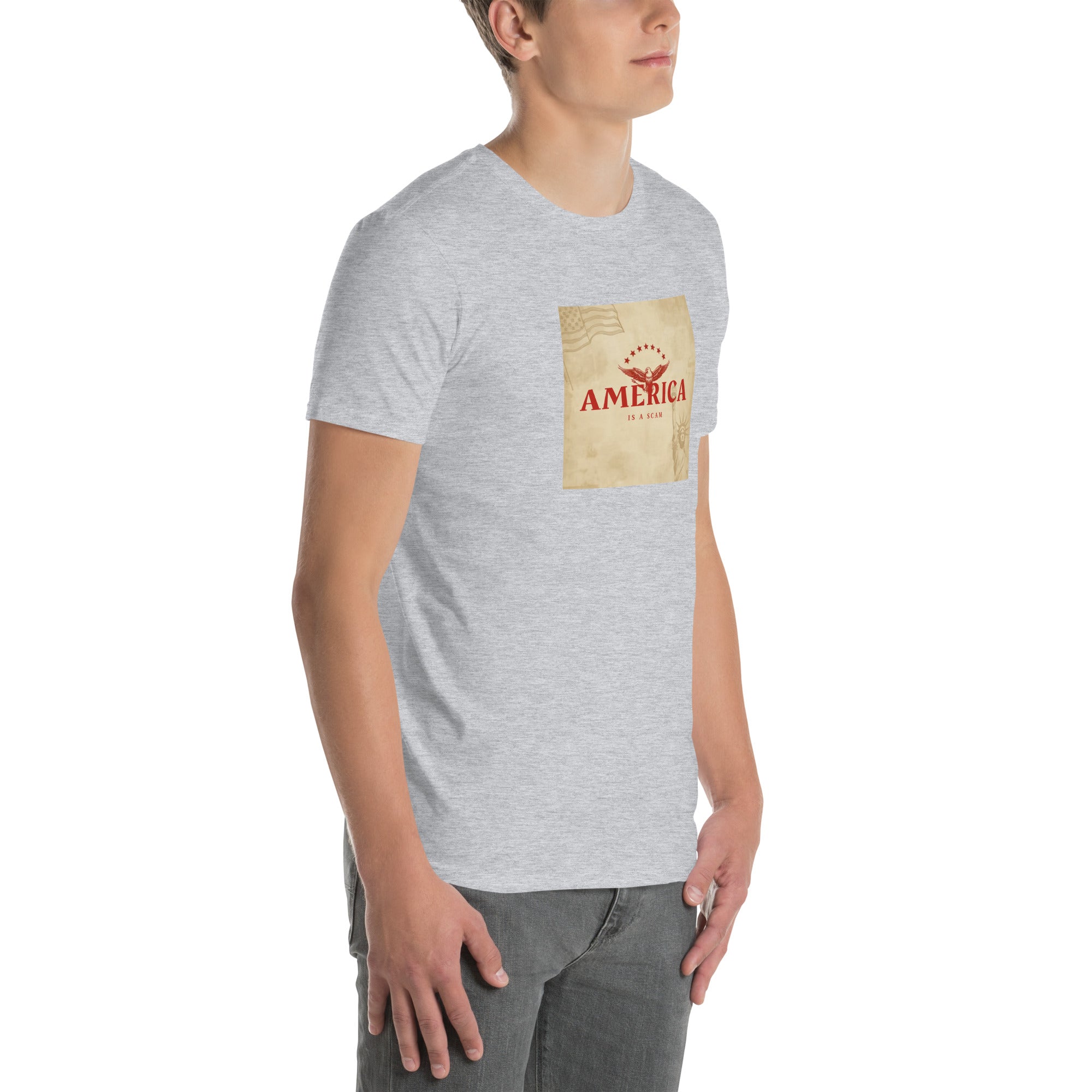 Heather grey unisex T-shirt with “America Is A Scam” graphic on chest.