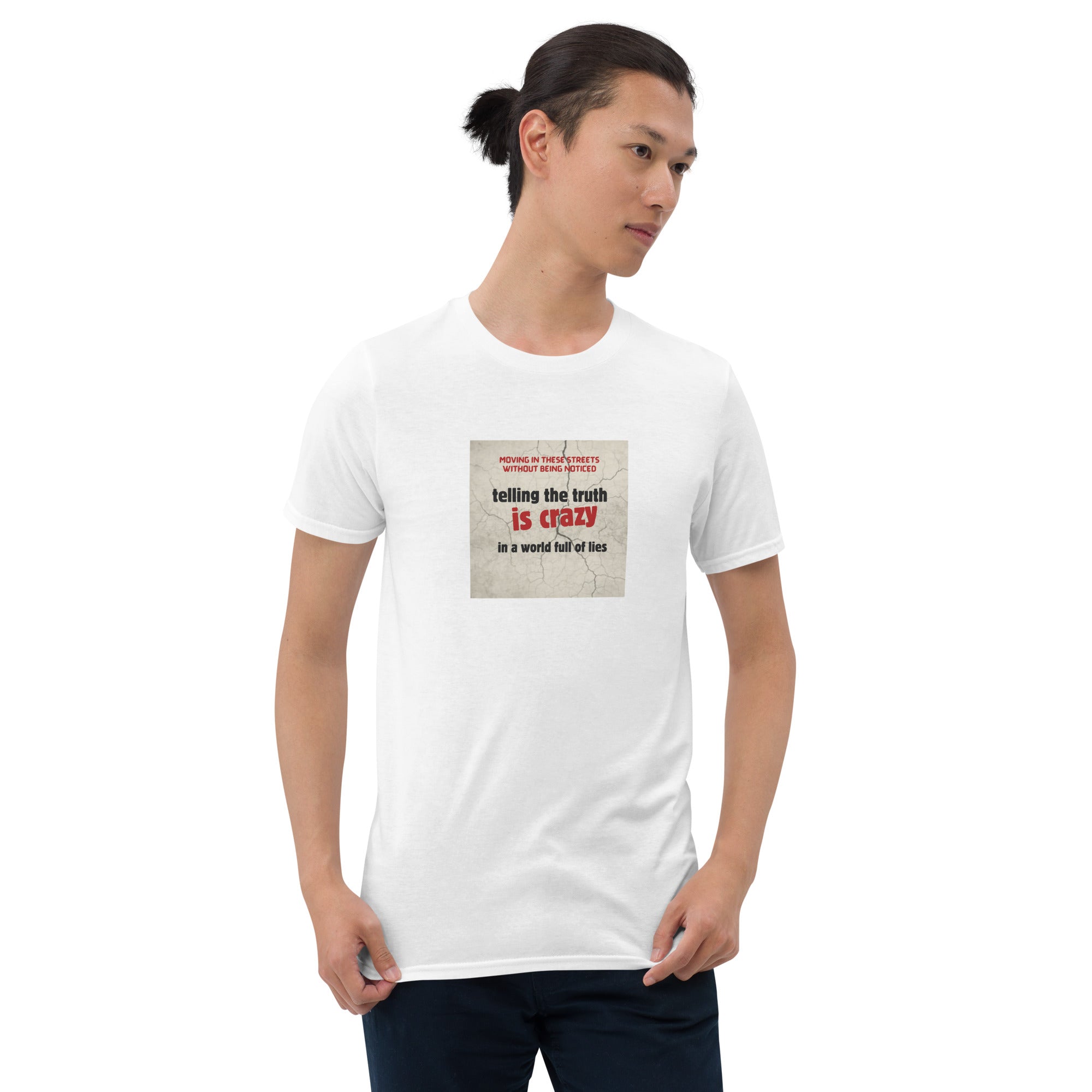 White T-shirt with square front quote graphic: “Telling the truth is crazy”