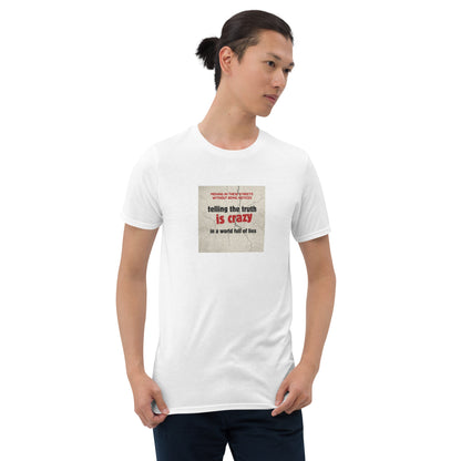 White T-shirt with square front quote graphic: “Telling the truth is crazy”