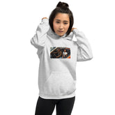 Unisex hoodie in light gray, front view with hood and kangaroo pocket; chest graphic panel