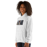 Light gray unisex pullover hoodie front three-quarter view with hood and graphic print