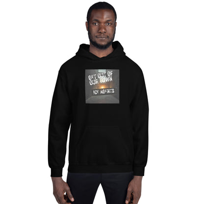 Black hoodie with front graphic print, drawstring hood, and kangaroo pocket