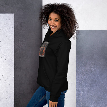 Black streetwear hoodie side view with left chest graphic and pullover hood.