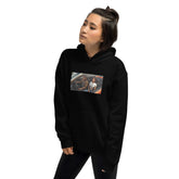 Black unisex hoodie with hood, pouch pocket, and chest graphic print, 3/4 view.