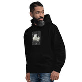 Unisex black hoodie with front print and kangaroo pocket, front angled view