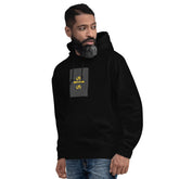 Unisex hoodie in black, front view with hood and kangaroo pocket