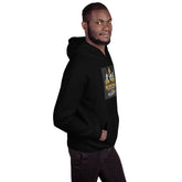 Unisex black pullover hoodie with hood, front pocket, and gold graphic chest patch