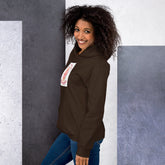 Brown unisex hoodie with hood and front graphic patch, side profile