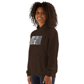 Dark brown unisex hoodie with hood and chest graphic, front three-quarter view.