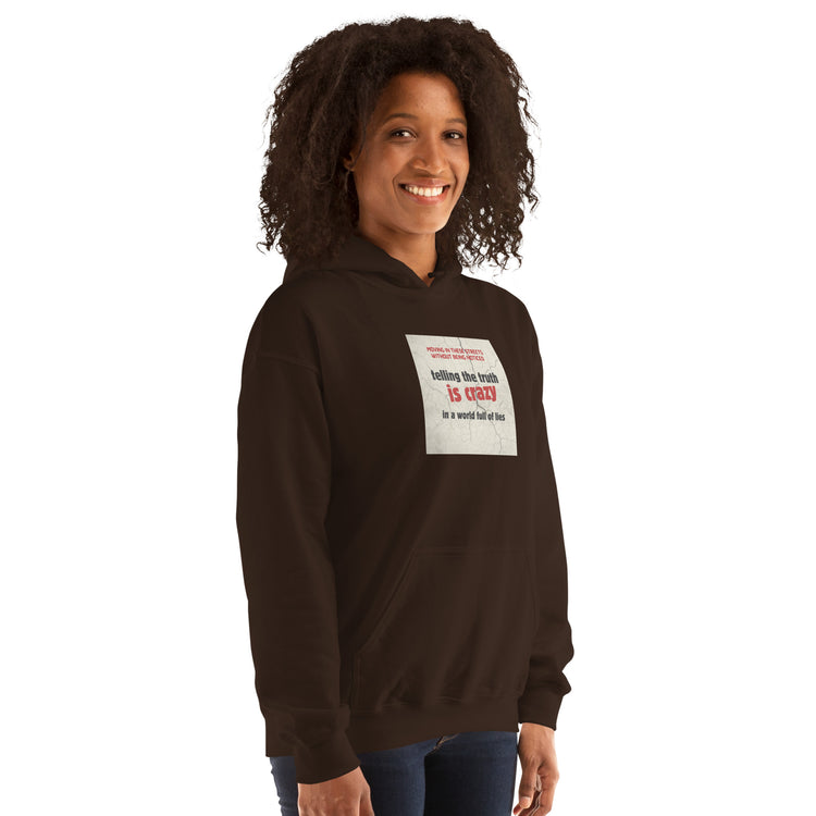 Dark hoodie front view with graphic square patch and kangaroo pocket