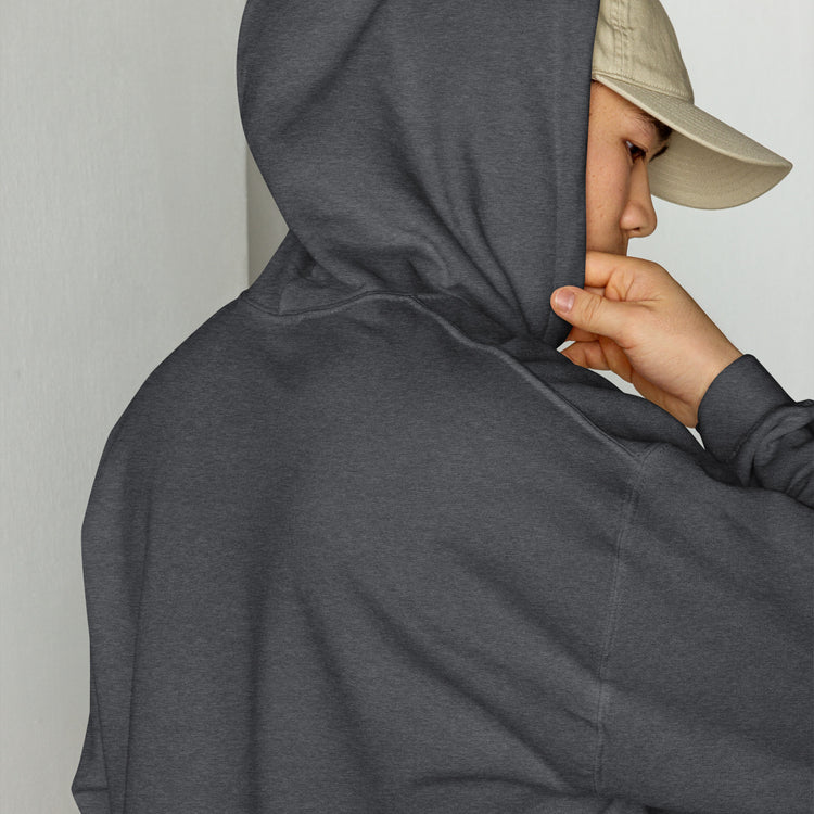 Unisex dark heather hoodie close-up, hand holding the hood opening