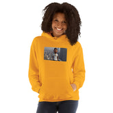 Unisex orange hoodie with hood, kangaroo pocket, and chest graphic print.