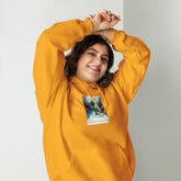 Gold unisex hoodie with chest graphic, hood with drawstrings, and front pouch pocket