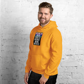 Unisex orange pullover hoodie with front graphic and kangaroo pocket.
