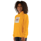 Mustard yellow hoodie with front hood, kangaroo pocket, and square chest graphic