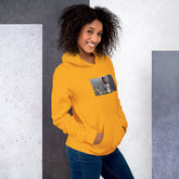 Yellow streetwear hoodie with front pocket, drawstring hood, and photo-style chest print