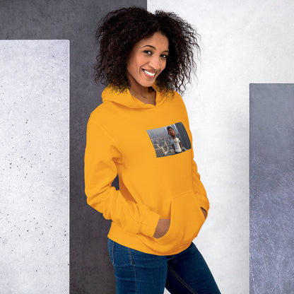Yellow streetwear hoodie with front pocket, drawstring hood, and photo-style chest print