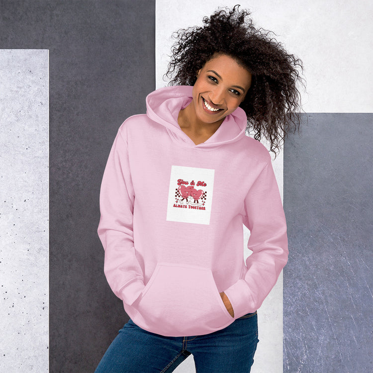 Light pink unisex hoodie with front pocket and small chest heart graphic