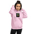 Light Pink unisex hoodie with front pocket and BELIEVE square graphic on chest