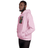 Pink unisex hoodie in side profile with front graphic print and hood