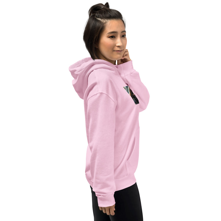 Unisex hoodie in light pink, side view with sleeves; hood and kangaroo pocket visible