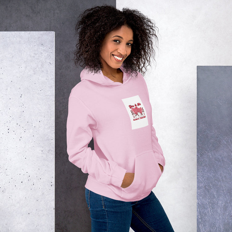 Light pink unisex hoodie three-quarter view with chest heart graphic and pocket