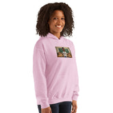 Light pink hoodie three-quarter view with chest graphic and hood