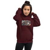 Unisex maroon pullover hoodie with hood, front pouch pocket, and chest photo graphic