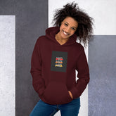Maroon unisex hoodie with front pocket and chest graphic, drawstring hood