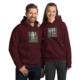 Unisex hoodie in maroon with front logo graphic, pullover hood, and kangaroo pocket