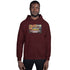 Maroon unisex hoodie with hood and centered chest graphic, front view