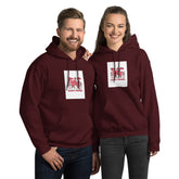Maroon pullover hoodie with hood and front pocket, square chest graphic print.