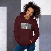 Maroon pullover hoodie with hood, front pouch pocket, and chest graphic photo patch
