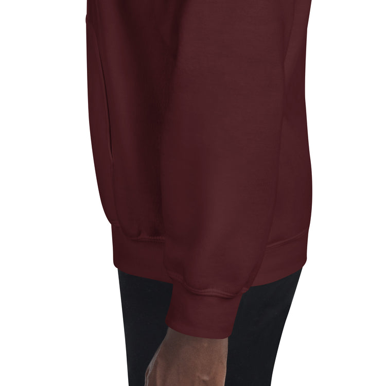Burgundy hoodie sleeve and hem close-up with ribbed cuffs