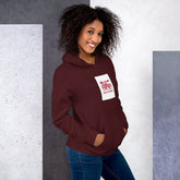 Maroon unisex hoodie with hood, front pocket, and square chest graphic patch