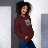Unisex maroon hoodie with front “Ice Agents” graphic patch on the chest
