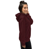 Unisex maroon hoodie with hood, side view, kangaroo pocket