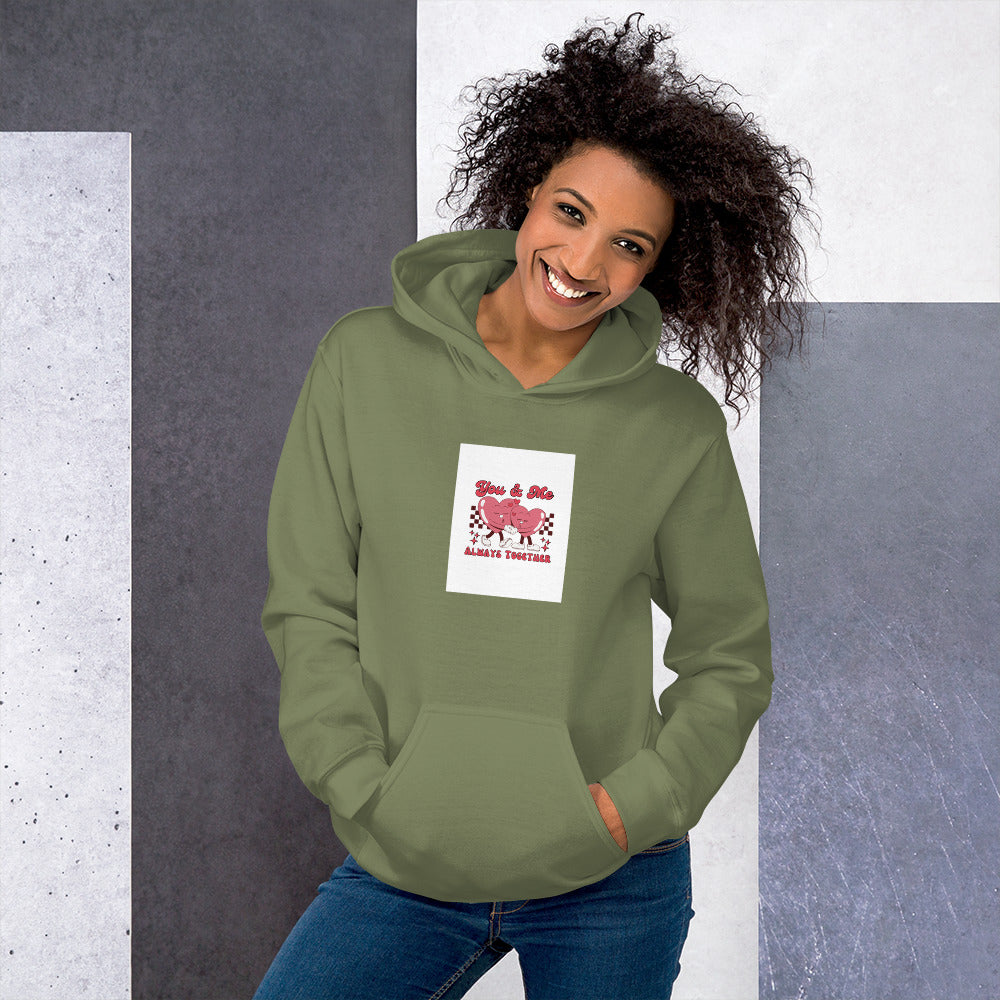 Unisex hoodie in olive green, front heart graphic patch and front pocket.