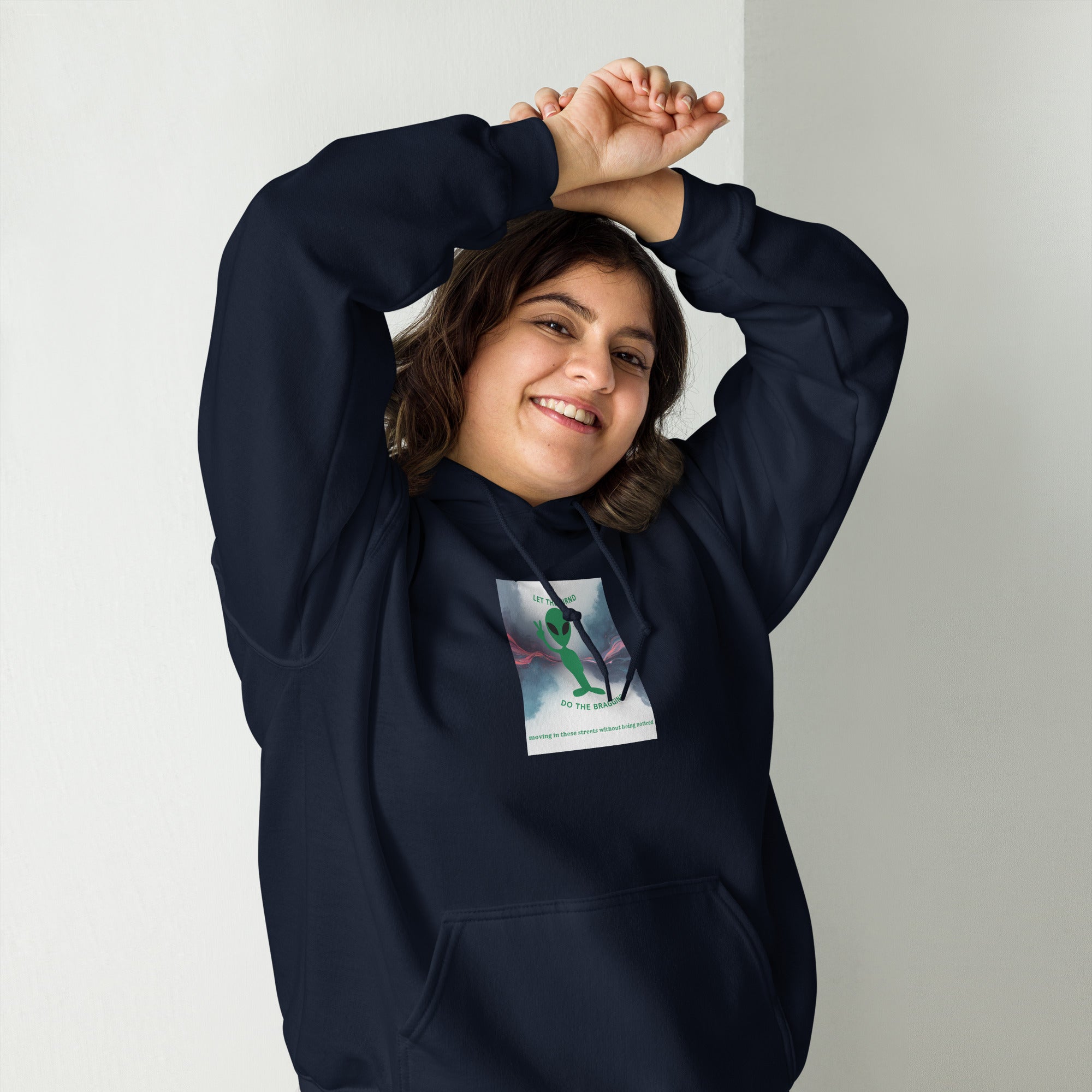Navy unisex hoodie with chest graphic, hood with drawstrings, and front pouch pocket