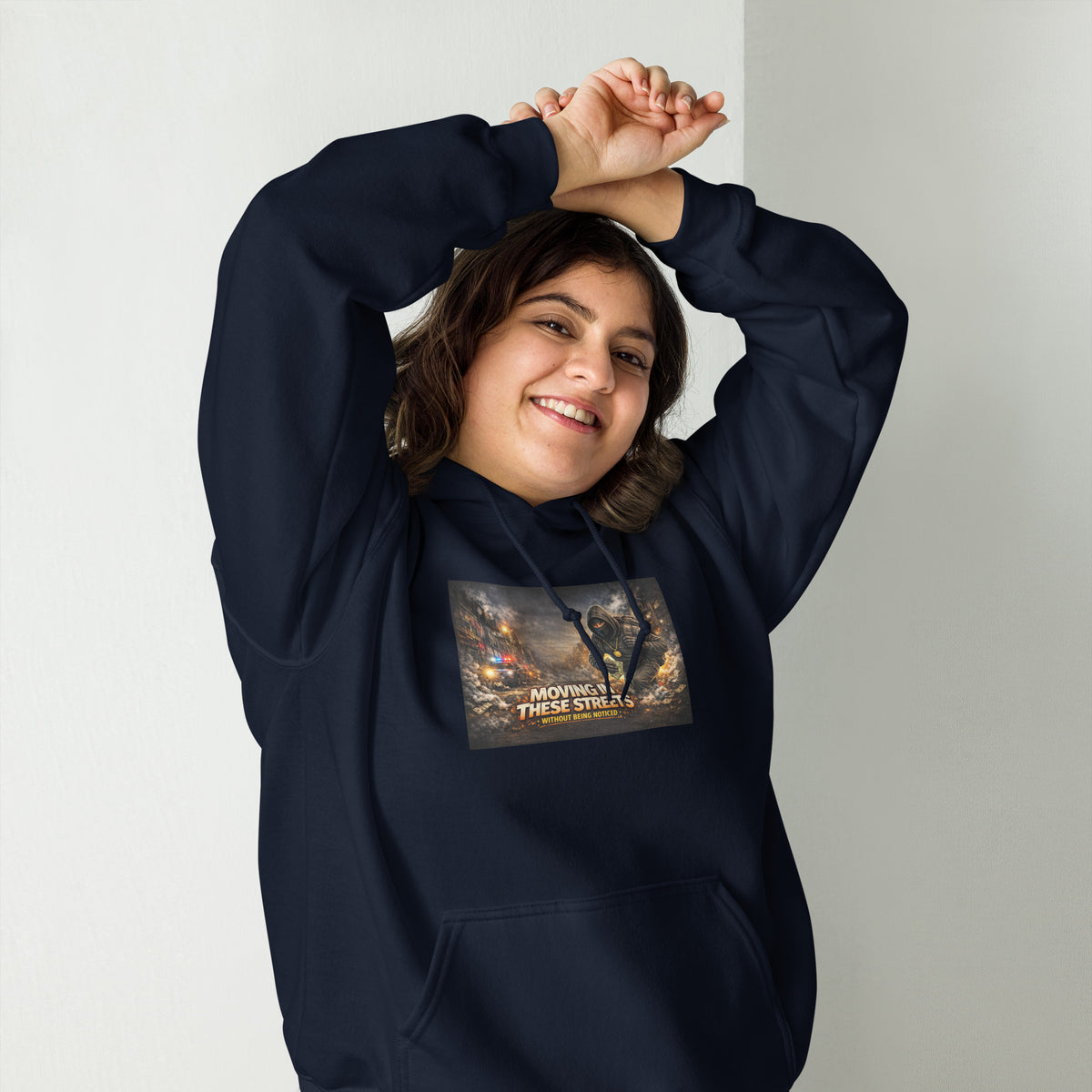 Navy pullover hoodie with hood, front pocket, and colorful street graphic on chest