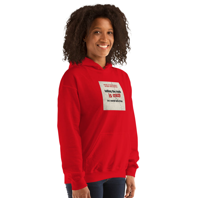 Red hoodie angled front view with chest graphic patch and kangaroo pocket