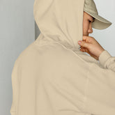 Unisex sand hoodie close-up with hood opening