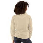 Light cream pullover hoodie, back view with hood and relaxed long sleeves