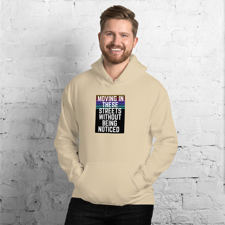 Unisex cream pullover hoodie with front graphic, hood and kangaroo pocket.
